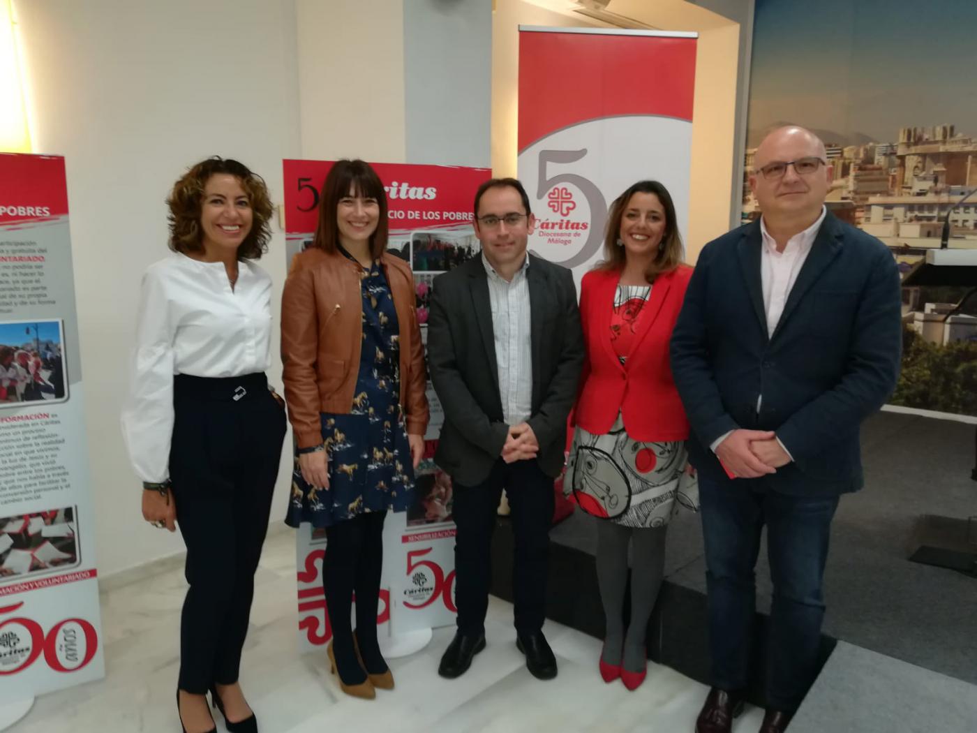 Inauguración de la exposición de Cáritas por su 50 aniversario en la casa hermandad de Estudiantes// CÁRITAS MÁLAGA