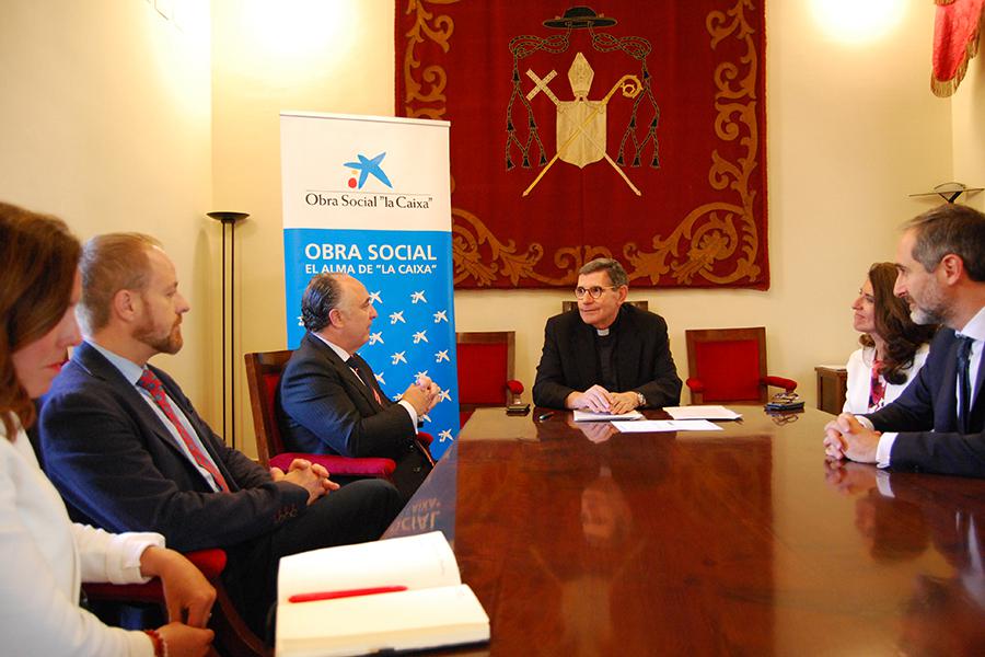 Firma del convenio de colaboración entre la Fundación Victoria y CaixaBank // A.MEDINA